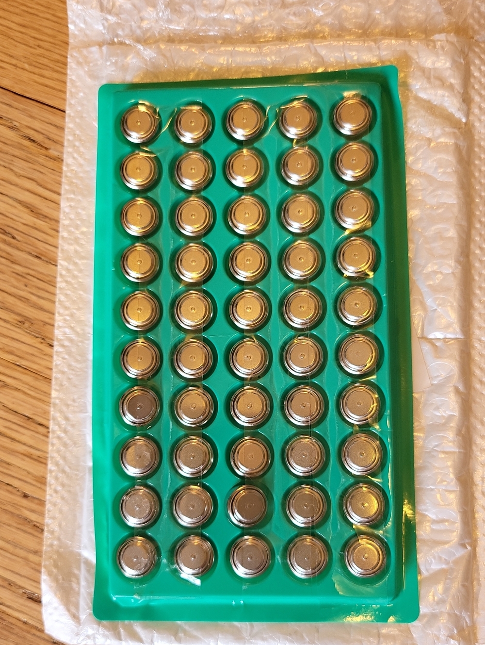Button Cell Battery Pack in Green Tray - Home Games